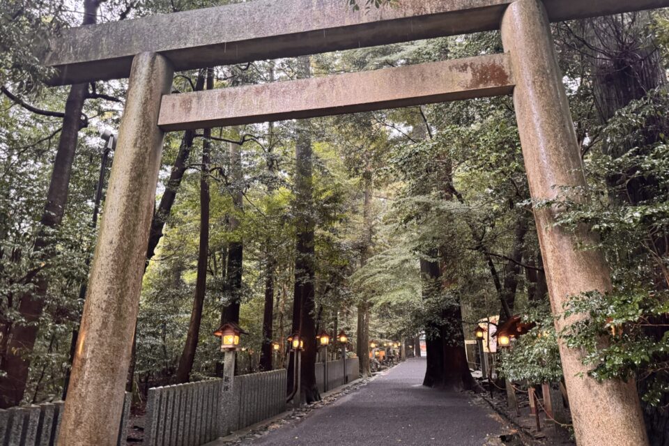 Stone torii and forest approach at Tsubaki Grand Shrine in Suzuka, Mie